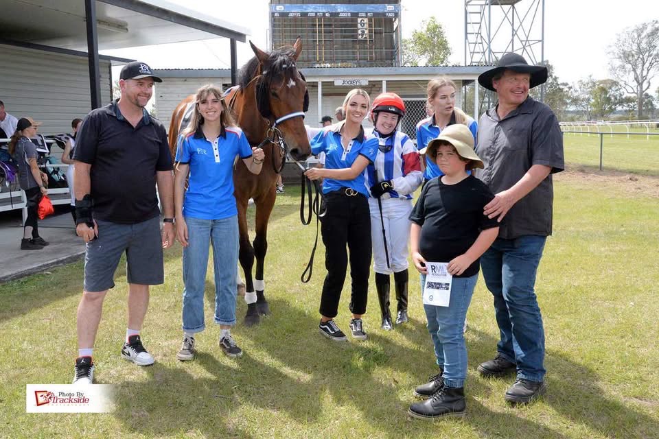 Winning connections and the jockey with their horse in the mounting yard at Tabulam Racecourse