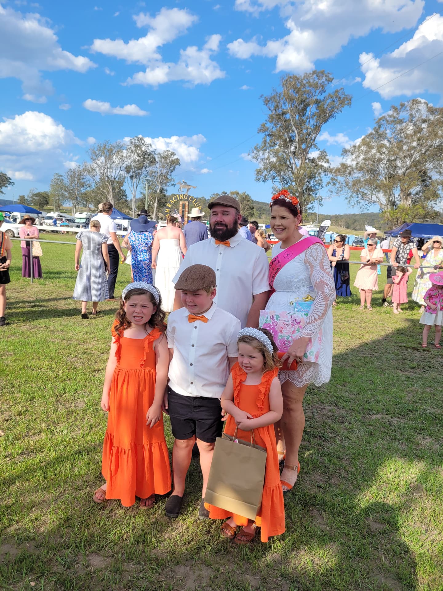 Best Dressed Family in matching orange at the races