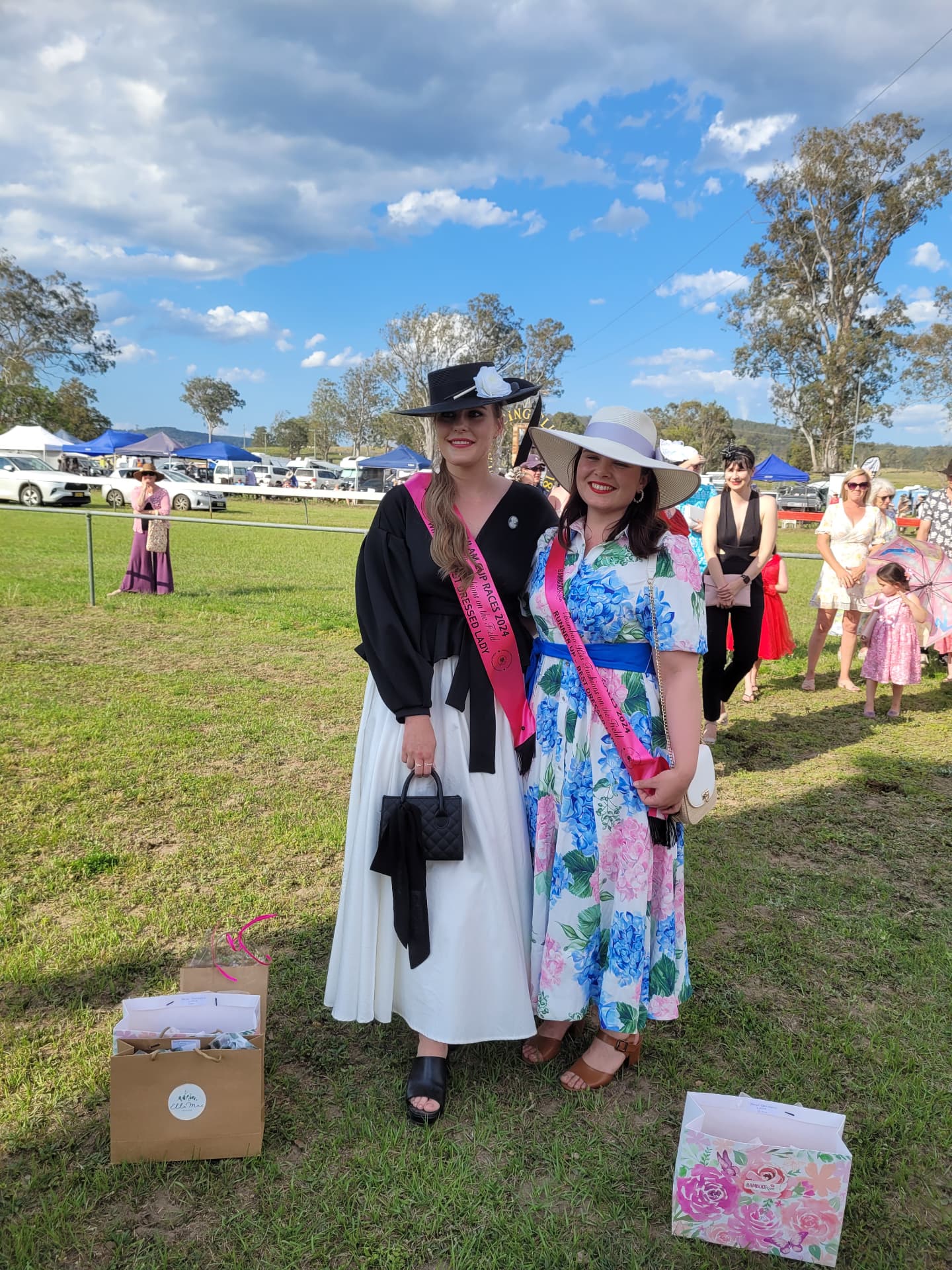 Fashions on the Field winners with their sashes