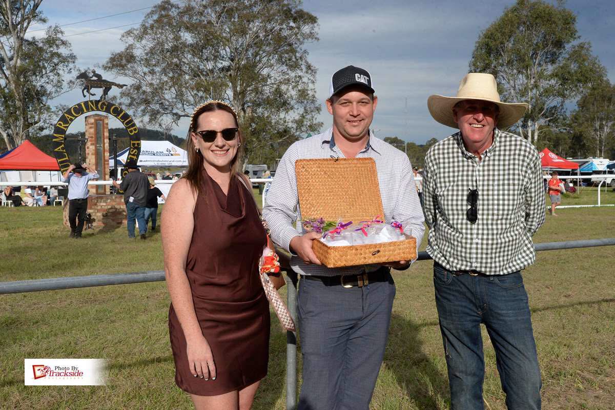 Trophy presentation with a prize hamper at the Tabulam Racing Club arch, Northern NSW country races